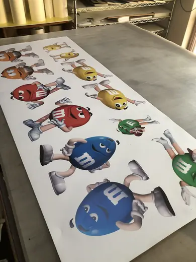 Sheet of printed candy-character stickers